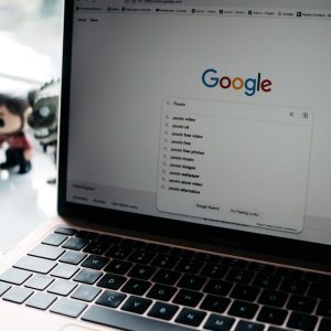 Photo of a Laptop Screen with Google Main Page on It